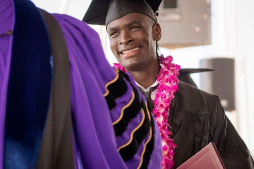 Kabogoza receives his diploma at Commencement 2016v