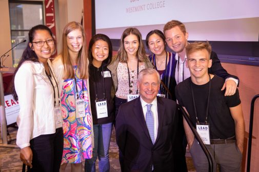 Jon Meacham poses with Westmont students