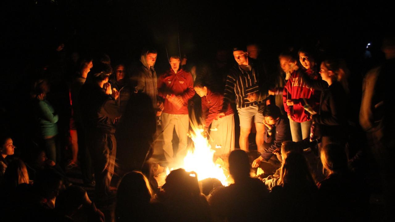 Students at a campfire